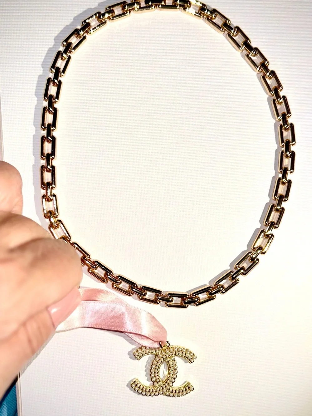 CHANEL Gold CC Pendant with Pink Ribbon New Elegant Chain